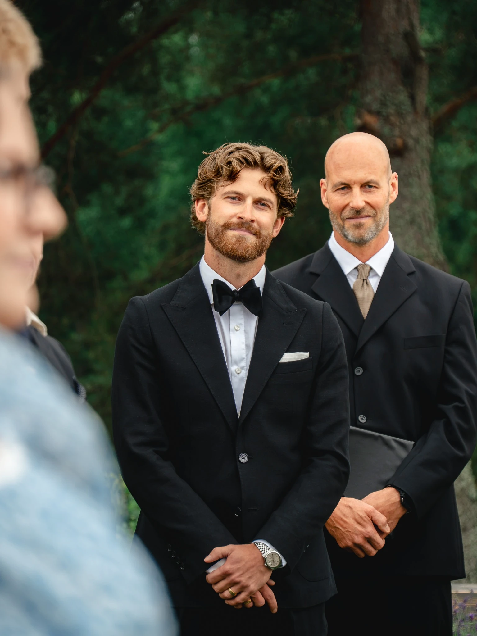Groom and officiant